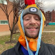 Do I need to pay for another entry if I bring my 5 year old kid to a race  and run with him via stroller?