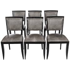 The formal dining room has a charming black rectangular dining table that matches with the black walls. Six Black Art Deco Dining Room Chairs Black White Raydesign Colored Leather For Sale At 1stdibs