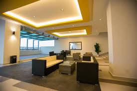 The kitchen features a fridge. The Majestic Condo Ipoh Malaysia Booking Com