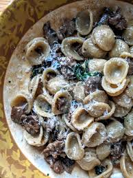 Creamy mushroom spinach pasta with caramelized onions is smothered in parmesan cream sauce. Homemade Orecchiette With Crumbled Italian Sausage Mushroom Spinach Cream Topped With Grated Pecorino Romano Cheese Food