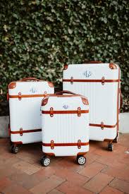 • on the reverse side of each lock you will see a small black button that you can push forward and backward. Mark Graham Terminal 1 Suitcase Review Giveaway