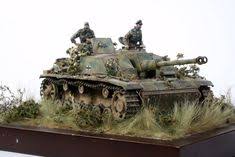 It was created to get the player excited about upgrading their assault teams on the strategy side of the game. 43 Wwii Diorama Ideas Diorama Military Diorama Military Modelling