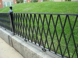 This one is minty green with white flowerheads. Black Wrought Iron Fence Ideas Dohoe Com Metal Garden Fencing Iron Fence Garden Fencing