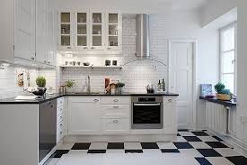 Black and white kitchen accessories. 5 1 Condominium In Linnestaden With Modern Accessories Modern Kitchen Flooring Modern Kitchen Tile Floor Curved Kitchen