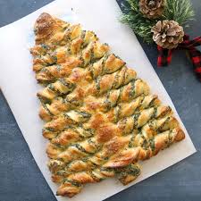 I love hosting around the holidays. These Christmas Tree Recipes Are Blowing Up On Pinterest Holiday Appetizers Recipes Appetizer Recipes Tree Spinach
