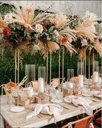70 Table Decoration Ideas For Indoor And Outdoor Weddings The First Hand Fashion News For Females Boho Wedding Centerpieces Tall Wedding Centerpieces Round Wedding Tables