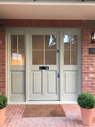 Cherry grain contemporary front door with three horizontal lites with two sidelites. Timber Doors In Oxfordshire Berks Bucks Kirkman Joinery