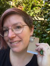 Hey all! I'm looking for the Vendor that sold these cute Christmas light  earrings. I have a question.