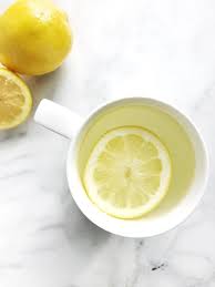 10 Foods To Eat When You Re Feeling Bloated Lemon Water Benefits Drinking Lemon Water Drinking Hot Lemon Water