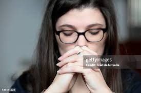 12.574 Young Woman Praying Stock Photos, High-Res Pictures, and Images