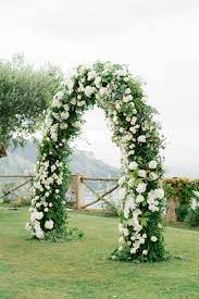 A wedding arch takes your ceremony to new heights and frames the moment you become newlyweds. Wedding Arch Inspiration We Love For Your Ceremony Martha Stewart