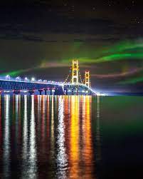 While we watched the wonder of waving color from the headlands shoreline labor day weekend 2016, jason gillman was two miles east, catching the aurora as it draped itself beautifully over the shoulders of the mackinac bridge. The Northern Lights Over The Mackinac Bridge Michigan Usa Pics Northern Lights Michigan Mackinac Bridge Michigan Road Trip