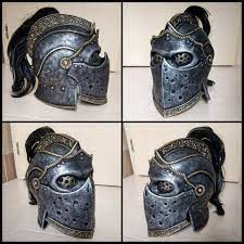 He wears a metal musculata curiass and bracers. Apollyon Helmet From For Honor Cosplay Progress By Germia Honor Helmet Leather Armor Fashion Accessories Photography Fantasy Battle