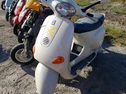 Image result for Beige Cammeo 2005 Piaggio