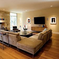 Corner Section In The Middle Of Room Two Small Couches With An Ottoman As Corner Home Living Room Home And Living Mid Century Modern House