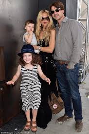 This article here is about her and what she is doing post her parents' divorce. Rachel Zoe Shows Off Her Stylish Brood In La For John Varvatos Event David Schwimmer Daughter John Varvatos