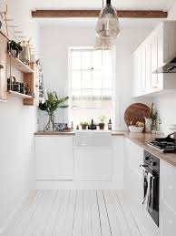 A small table, two chairs, and a stool (at right) provide a spot for dining, with. Big Ideas For A Small Kitchen Tierney Kitchens