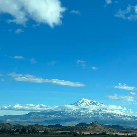 View of Mt. Shasta from airplane window flying into Medford, Oregon
