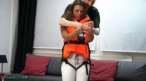 BoundHub - Senta is trying a life jacket and her handcuffs