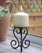 He could adjust the height of the candle and. Black Ornate Scroll Wrought Iron Metal Church Pillar Candle Holder Stand Candels Sta Wrought Iron Candle Holders Black Iron Candle Holders Iron Candle Holders