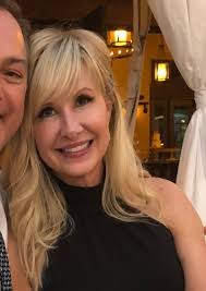 What color to paint a house with grey and red brick?