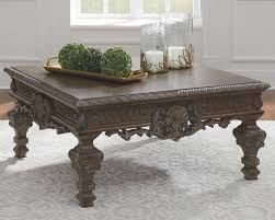 Includes coffee table and 2 end tables. Charmond Coffee Table Brown Coffee Table Ashley Furniture Square Cocktail Table