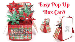 Lay the card that has the outline of the tree on a flat surface. Christmas Pop Up Card Mixed Up Craft
