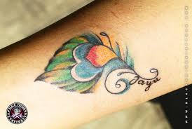 Peacock feathers are not considered bad luck in the place where peacocks really come from: Peacock Feather Tattoo Best Tattoo Studio In India Black Poison Tattoosc