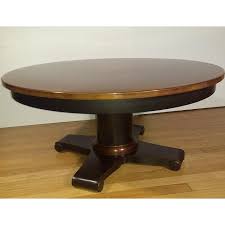 If you have a particularly soft rug, consider sitting on the ground around your table and using it for a game night or wine and cheese party. Crate Barrel Collina Round Copper Topped Coffee Table With Black Metal Base Chairish