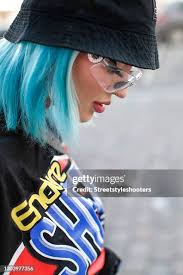 Influencer and Content Creator Naomi Jon wearing a black bucket hat... News  Photo