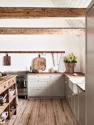 farmhouse kitchen in osterlen coco lapine design cuisine bois cuisine blanche et bois cuisines deco