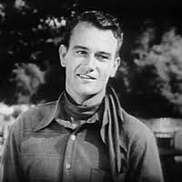 John Wayne and Ella Raines in Tall in the Saddle 2