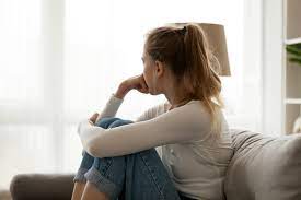 Find another word for upset. Upset Woman Sitting On Couch Alone At Home Evidently Cochrane