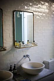 Not Only Is The Tray On This Mirror Helpful But We Love The Retro Look Of It Against The Hig Bathroom Mirror With Shelf Townhouse Interior Bathroom Inspiration