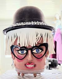 Finished my Grinch. Let me know your thoughts. Fur, felt (eyes) and  chenille stem (mouth) all DT. Head is up cycled empty bourbon bottle and  hat materials came from Joann Fabrics |