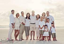 Natural or neutral colors are always a safe bet when it comes to taking photos in the outdoors. I Like The Whole Sandy Look Of This One The Beach Combined With The Family Colors Looks Re Family Beach Pictures Large Family Photos Large Family Portraits