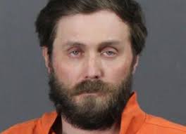 Aurora police use dog to arrest man wanted for violating 'red flag' law