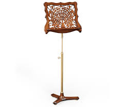 My wooden music stands are built from my own original, copyrighted design. Adjustable Wooden Music Stand With Fretwork Swanky Interiors