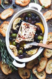 Baked Feta Cheese With Olives And Lemon Thanksgiving Appetizers Easy Appetizer Recipes Clean Eating Snacks