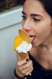 Portrait of Brunette Girl with Lemon and Vanilla Ice Cream in Summer Stock  Image