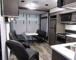 .kitchen front living king bed kitchen island loft murphy bed outdoor entertainment outdoor kitchen rear bath rear bedroom rear entertainment rear kitchen rear living area rear twin side ramp two entry/exit doors two full baths u shaped dinette. New Or Used Travel Trailer Campers For Sale Rvs Near Madison