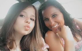 Hi all! I just wanted to introduce myself and share a photo I took this is  my daughter Melinda she died in March of 2009 holding her 5year old brother  who is