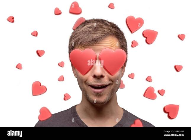 Portrait of a man with heart shaped eyes isolated on white Stock Photo -  Alamy