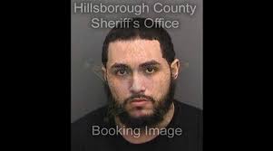 Fans catch man who they say sold fake tickets to title game, pin him to  chair