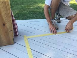 Maureen cataldo says, i used the grecian tile damask stencil to paint a rug on a new deck floor. Painted Diy Outdoor Rug Tutorial The Heathered Nest