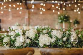 What kind of flowers should i get for a wedding? White And Green Flowers Wedding Flowers Reception Flowers Landscape Table Arrangement C Greenery Wedding Arch Flower Centerpieces Wedding Reception Flowers