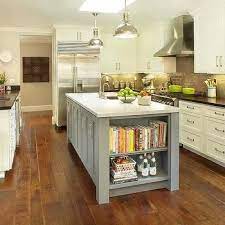 The easiest way to decorate your kitchen island is to place something in the middle. Campaign Hardware Transitional Kitchen Grey Kitchen Designs Kitchen Bookshelf Classy Kitchen