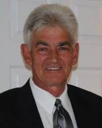 Malcolm “Mac” J. Taylor, Jr.