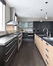 See more ideas about brick chimney, exposed brick, kitchen remodel. Detroit Wolf Kitchen Hood Contemporary Kitchen Black Countertop Wood Chimney Gray Light Island Cabinets Medium Floor Modern Pendant