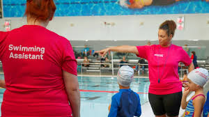 Support Teacher and Teacher of School Swimming